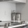 a kitchen with a stove and a coffee maker