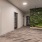 a room with a wood floor and a wood floor with a door and a glass wall with a
