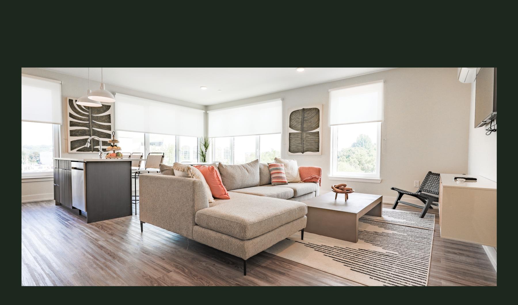 Find your perfect fit at Canfield Park at Fairfield Metro a living room with a couch and a table